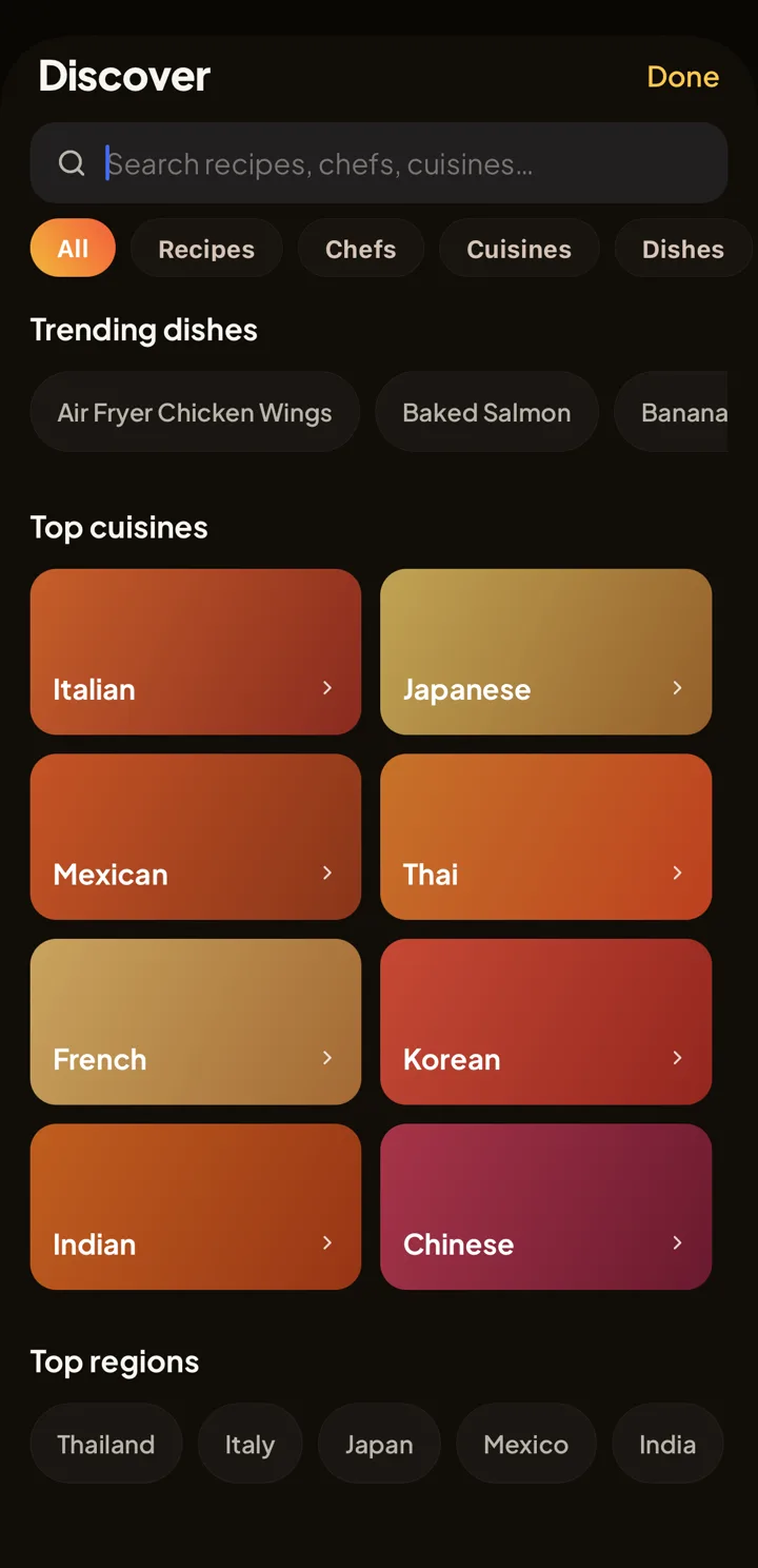 Discover screen with a search field for recipes, chefs, and cuisines, filter chips for All, Recipes, Chefs, Cuisines, and Dishes, trending dishes such as Air Fryer Chicken Wings and Baked Salmon, a grid of top cuisines from Italian to Chinese, and top regions such as Thailand and Italy.
